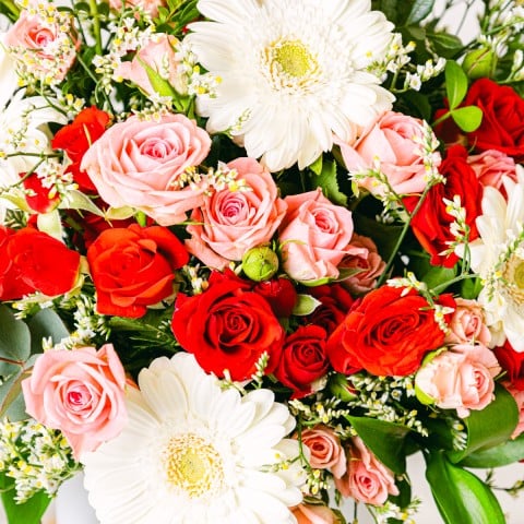 Pure Heart: Spray Roses and Mini Gerberas highlight